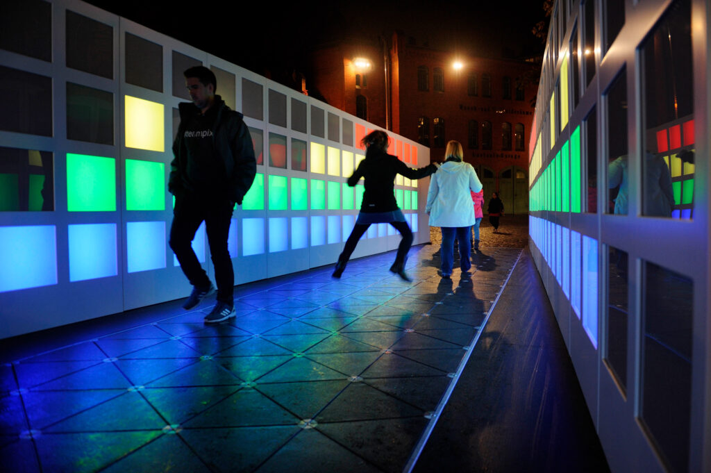 Walls that light up according to the movement of people on Pavegen's flooring